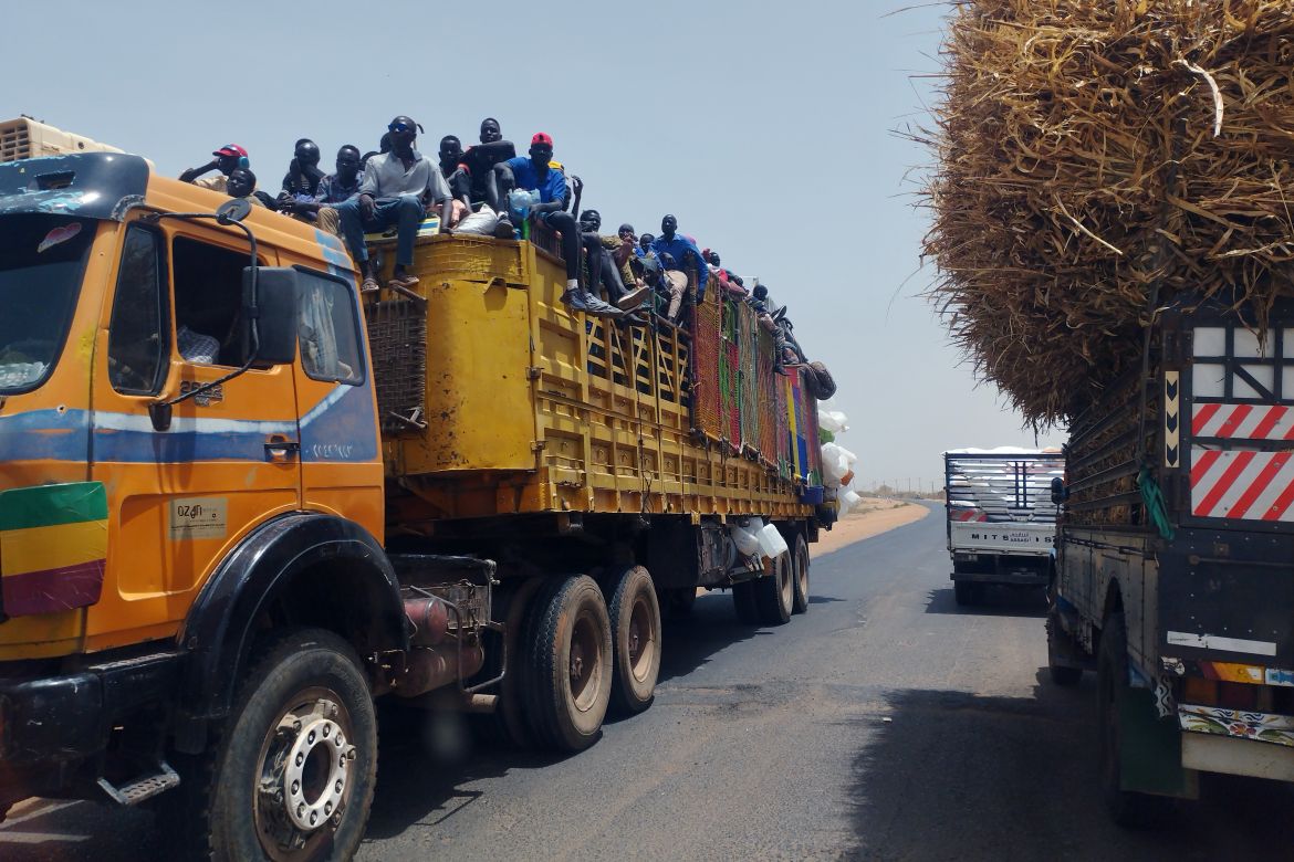 Families sharing a truck to move to Wad Madani from Khartoum, in this image taken in June 2023