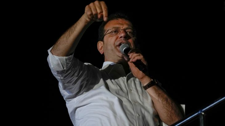 Istanbul Mayor and Republican People's Party, or CHP, candidate Ekrem Imamoglu addresses supporters outside the City Hall in Istanbul, Turkey, early Monday, April 1, 2024.