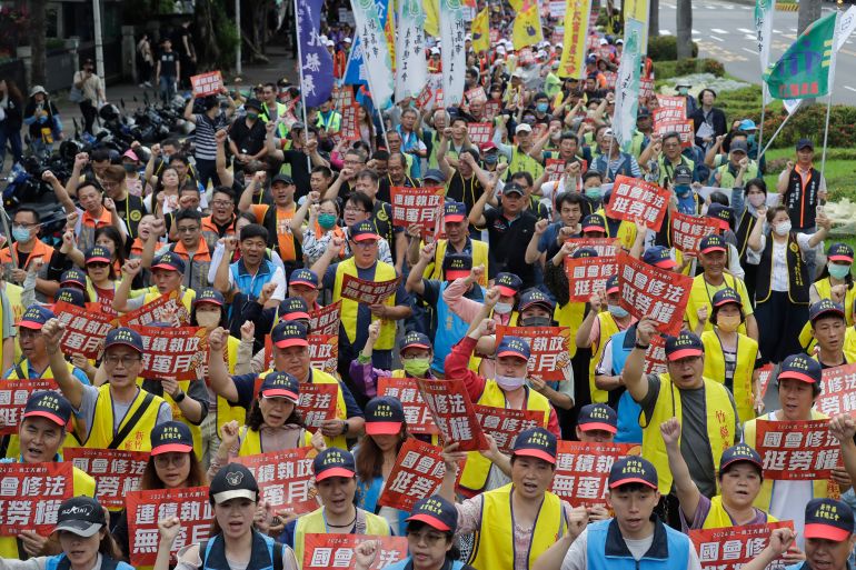Workers across Asia hold May Day rallies to call for greater labour rights