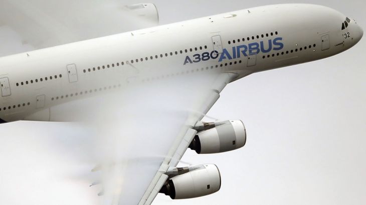 In this June 18 2015 file photo, vapor forms across the wings of an Airbus A380 as it performs a demonstration flight at the Paris Air Show, Le Bourget airport, north of Paris.