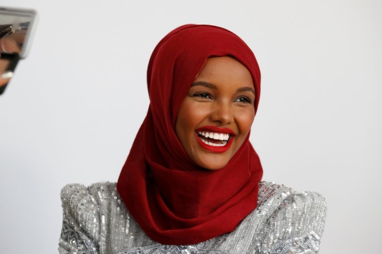 Fashion model and former refugee Halima Aden, who is breaking boundaries as the first hijab wearing model gracing magazine covers and walking in high profile runway shows has her makeup applied during