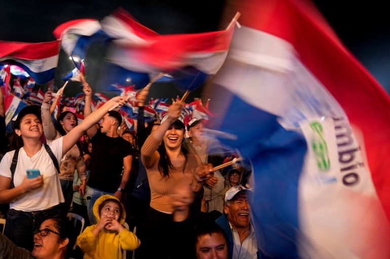 FILE - Supporters of Efrain Alegre, presidential candidate for the Concertacion coalition, cheer during his closing campaign rally in Asuncion, Paraguay, April 27, 2023. Alegre, a 60-year-old lawyer, is making his third bid for the presidency. Paraguay's general elections are scheduled for Sunday, April 30th. (AP Photo/Jorge Saenz, File)