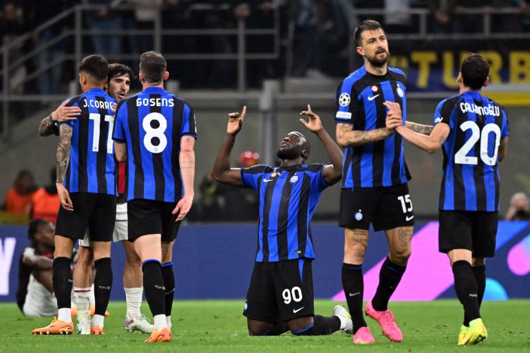 Inter Milan's Romelu Lukaku, Francesco Acerbi, Hakan Calhanoglu and Robin Gosens celebrate after the match.