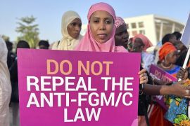 Women picketed outside the Gambian parliament in Serrekunda while legislators voted to reverse a ban on female genital mutilation [File: Hadim Thomas-Safe Hands for Girls via AP]