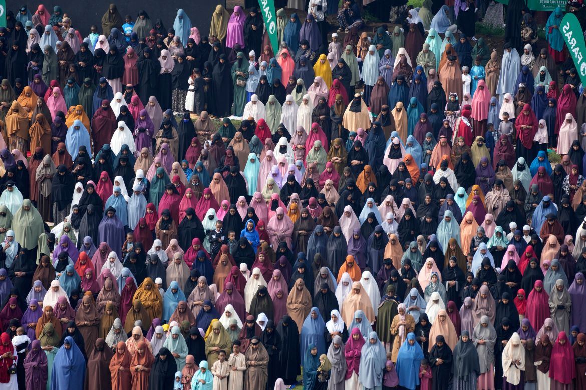 Muslim women devotees offer Eid al-Fitr prayers to mark the end of Ramadan, the Islamic holy month of fasting, in Nairobi, Kenya