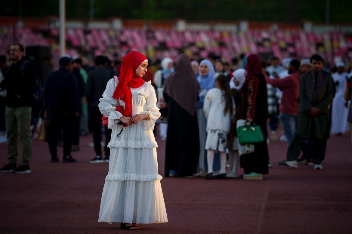 Muslims perform an Eid al-Fitr prayer, marking the end of the fasting month of Ramadan