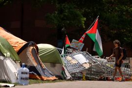 Students erect a pro-Palestinian encampment at George Washington University in Washington, DC [Mark Schiefelbein/The Associated Press]